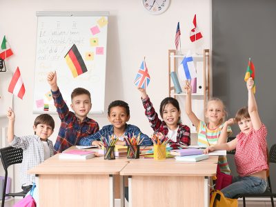 Little children during lesson at language school